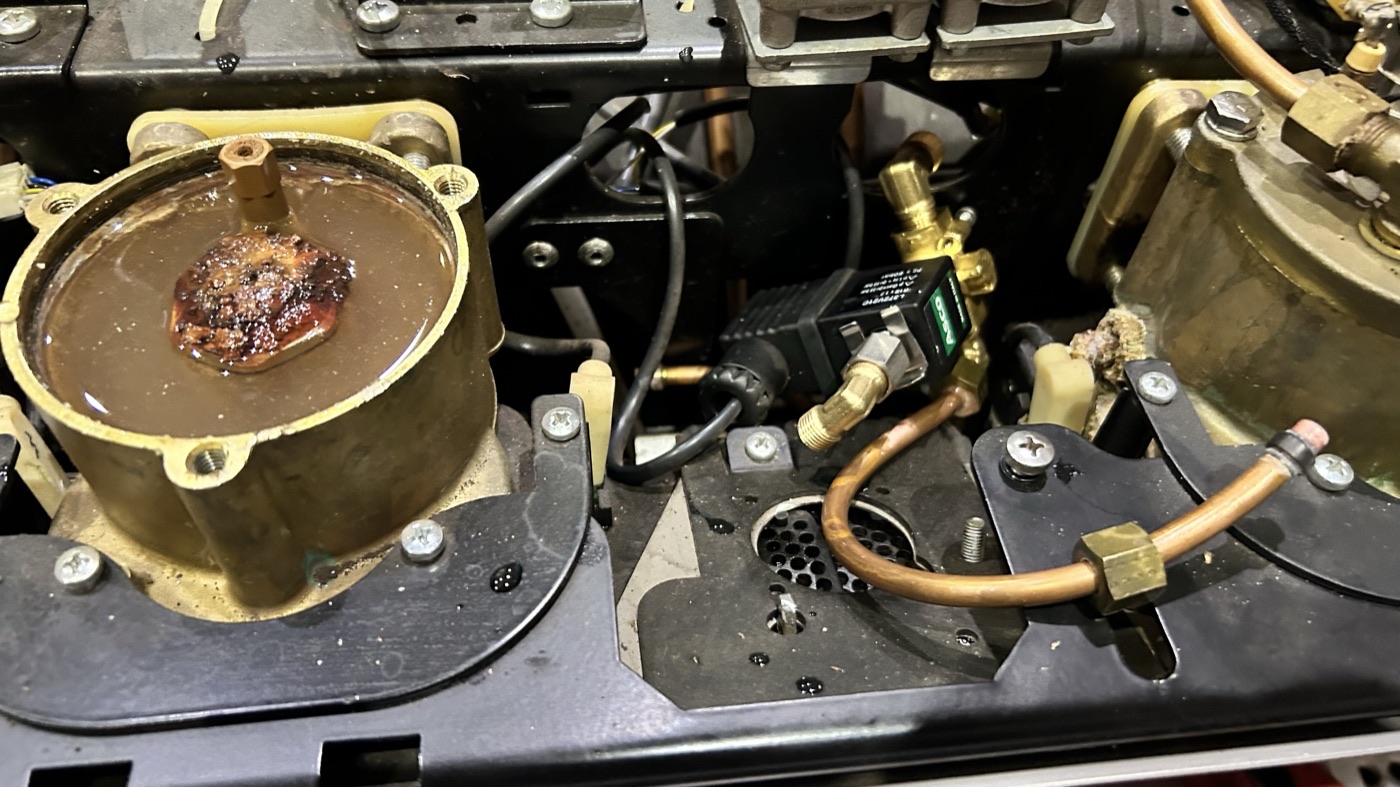 Scaled and corroded boiler and group from a machine run on untreated water